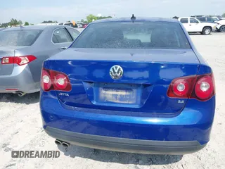 2009 Volkswagen Jetta SE z VIN 3VWRZ71K99M159242, wystawiony jako IAAI lot #42200917 z przebiegiem 226 285 mil mil oraz . Historia ofert i sprzedaży dostępna na DreamBid. Obrazek 17.