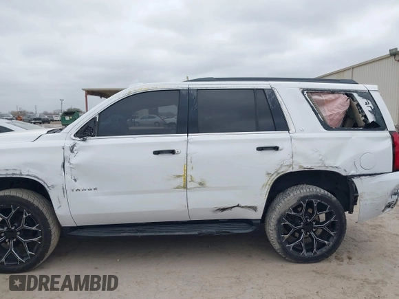 2015 Chevrolet Tahoe LT with VIN 1GNSCBKC4FR530776, listed as a IAAI auction lot 41754350 with 174,694 mi miles and . Bid and sale history available at DreamBid. Image 14.