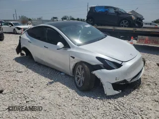 2023 Tesla Model Y Long Range z VIN 7SAYGDEE4PA064502, wystawiony jako Copart lot #53337645 z przebiegiem 16 945 mil mil oraz Szkoda całkowita • Salvage title. Historia ofert i sprzedaży dostępna na DreamBid. Obrazek 4.