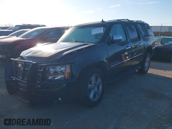 2012 Chevrolet Suburban LTZ with VIN 1GNSKKE75CR133445, listed as a IAAI auction lot 41590306 with 203,592 mi miles. Bid and sale history available at carsss.com. Image 2.