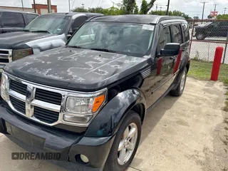 2007 Dodge Nitro SLT z VIN 1D8GU58K77W690568, wystawiony jako Copart lot #61766405 z przebiegiem 177 426 mil mil oraz Czysty tytuł • Clean title. Historia ofert i sprzedaży dostępna na DreamBid. Obrazek 2.