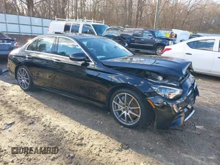 2021 Mercedes-Benz E-Class E 450 with VIN W1KZF5KB8MB002449, listed as a IAAI auction lot 41224307 with 57,093 mi miles. Bid and sale history available at carsss.com. Image 1.