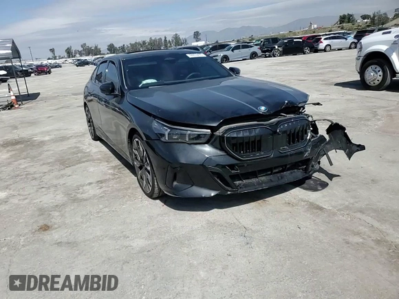 2024 BMW 5 Series 530i z VIN WBA43FJ08RCS17556, wystawiony jako Copart lot #48853495 z przebiegiem 4 151 mil mil oraz Szkoda całkowita • Salvage title. Historia ofert i sprzedaży dostępna na DreamBid. Obrazek 10.