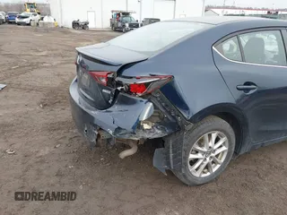 2014 Mazda 3 i Touring with VIN JM1BM1V7XE1170425, listed as a IAAI auction lot 41557903 with 111,946 mi miles and . Bid and sale history available at DreamBid. Image 6.