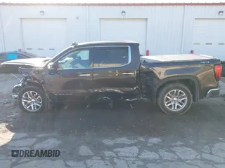 2021 GMC Sierra 1500 SLT z VIN 3GTU9DED9MG176881, wystawiony jako IAAI lot #41140356 z przebiegiem 21 553 mil mil oraz . Historia ofert i sprzedaży dostępna na DreamBid. Obrazek 15.