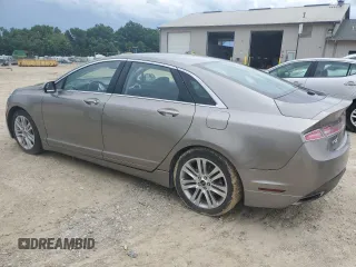 2015 Lincoln MKZ Hybrid z VIN 3LN6L2LU4FR625940, wystawiony jako Copart lot #61721025 z przebiegiem 56 151 mil mil oraz Szkoda całkowita • Salvage title. Historia ofert i sprzedaży dostępna na DreamBid. Obrazek 2.