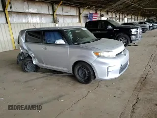 2012 Scion xB with VIN JTLZE4FE5CJ023537, listed as a Copart auction lot 55863315 with 230,648 mi miles and Salvage Title. Bid and sale history available at DreamBid. Image 13.