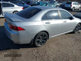 2004 Acura TSX w/Navigation with VIN JH4CL96954C035277, listed as a IAAI auction lot 41766775 with 999,999 mi miles. Bid and sale history available at carsss.com. Image 4.
