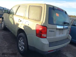 2008 Mazda Tribute Sport with VIN 4F2CZ02Z48KM28457, listed as a IAAI auction lot 41309277 with 149,493 mi miles. Bid and sale history available at carsss.com. Image 3.