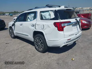 2021 GMC Acadia Denali with VIN 1GKKNPLS9MZ124774, listed as a IAAI auction lot 41859968 with 46,592 mi miles and . Bid and sale history available at carsss.com. Image 3.