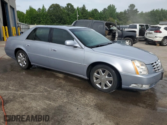 2006 Cadillac DTS 1SC z VIN 1G6KD57Y36U186630, wystawiony jako Copart lot #60792235 z przebiegiem 137 670 mil mil oraz Czysty tytuł • Clean title. Historia ofert i sprzedaży dostępna na DreamBid. Obrazek 4.