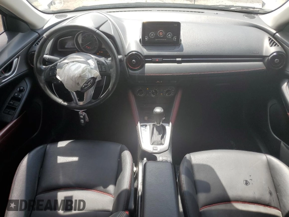2017 Mazda CX-3 Touring z VIN JM1DKDC78H0150588, wystawiony jako Copart lot #55284205 z przebiegiem 78 923 mil mil oraz Szkoda całkowita • Salvage title. Historia ofert i sprzedaży dostępna na DreamBid. Obrazek 8.