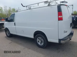 2012 Chevrolet Express Cargo Van with VIN 1GCWGFCA7C1121989, listed as a IAAI auction lot 42118853 with 214,478 mi miles. Bid and sale history available at carsss.com. Image 3.