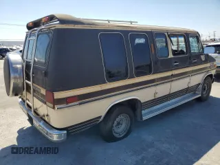 1985 Chevrolet Chevy Van z VIN 1GBEG25HXF7160399, wystawiony jako Copart lot #64115004 z przebiegiem 40 895 mil mil oraz Czysty tytuł • Clean title. Historia ofert i sprzedaży dostępna na DreamBid. Obrazek 3.