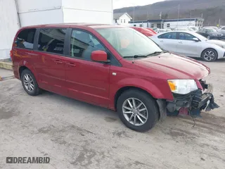2014 Dodge Grand Caravan SE with VIN 2C4RDGBG3ER451273, listed as a IAAI auction lot 41195129 with 42,640 mi miles. Bid and sale history available at carsss.com. Image 1.