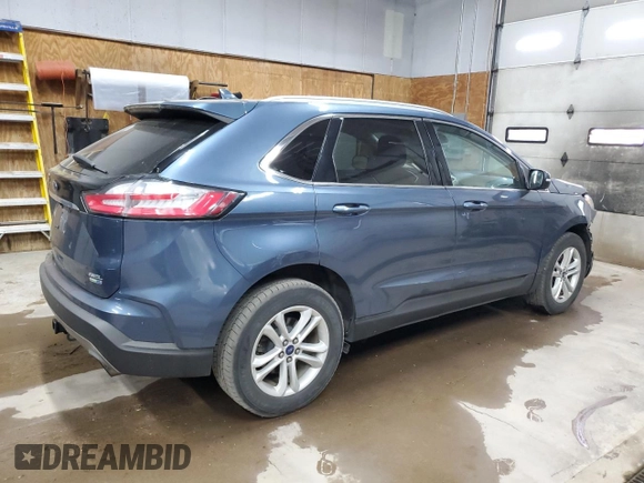 2019 Ford Edge SEL z VIN 2FMPK4J96KBB12912, wystawiony jako Copart lot #61029835 z przebiegiem 93 474 mil mil oraz Czysty tytuł • Clean title. Historia ofert i sprzedaży dostępna na DreamBid. Obrazek 3.