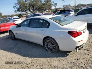 2014 BMW 7 Series 740Li xDrive with VIN WBAYF4C58ED281977, listed as a Copart auction lot 44084005 with 154,592 mi miles and Clean Title. Bid and sale history available at carsss.com. Image 2.