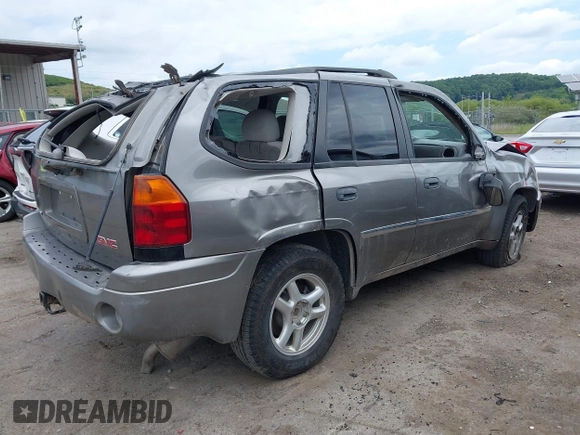 2007 GMC Envoy SLE with VIN 1GKDS13S272278285, listed as a IAAI auction lot 40006486 with 158,109 mi miles. Bid and sale history available at carsss.com. Image 4.