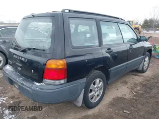 1999 Subaru Forester L with VIN JF1SF6351XH702931, listed as a IAAI auction lot 41612373 with 149,171 mi miles. Bid and sale history available at carsss.com. Image 4.