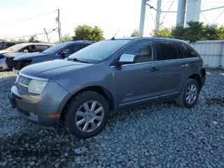 2009 Lincoln MKX with VIN 2LMDU88C69BJ13322, listed as a Copart auction lot 70686844 with 129,384 mi miles and Salvage Title. Bid and sale history available at carsss.com. Image 1.