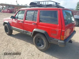 1996 Jeep Cherokee Sport with VIN 1J4FT68S4TL326973, listed as a IAAI auction lot 42744791 with 215,905 mi miles and . Bid and sale history available at DreamBid. Image 3.