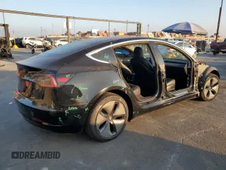 2019 Tesla Model 3 Mid Range z VIN 5YJ3E1EA8KF306096, wystawiony jako Copart lot #82712354 z przebiegiem 170 775 mil mil oraz Szkoda całkowita • Salvage title. Historia ofert i sprzedaży dostępna na DreamBid. Obrazek 3.
