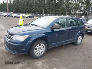 2014 Dodge Journey American Value Pkg with VIN 3C4PDCAB4ET149493, listed as a IAAI auction lot 41549858 with 117,905 mi miles. Bid and sale history available at carsss.com. Image 2.