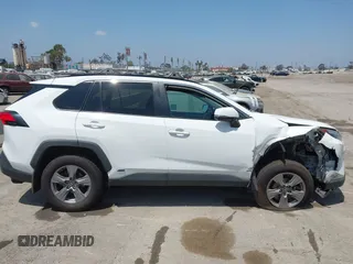 2022 Toyota RAV4 Hybrid XLE with VIN 2T3RWRFV9NW130472, listed as a IAAI auction lot 40990707 with 156,174 mi miles and . Bid and sale history available at DreamBid. Image 13.