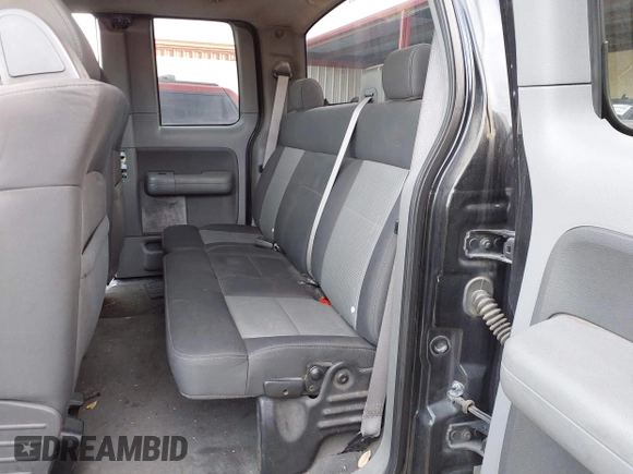 2007 Ford F-150 STX with VIN 1FTRX02WX7KA55431, listed as a IAAI auction lot 41693108 with 451,994 mi miles. Bid and sale history available at carsss.com. Image 8.