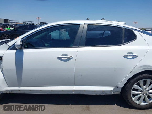 2015 Kia Optima EX z VIN 5XXGN4A72FG421289, wystawiony jako IAAI lot #42692024 z przebiegiem 91 000 mil mil oraz . Historia ofert i sprzedaży dostępna na DreamBid. Obrazek 14.