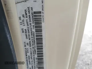 2006 Volkswagen Beetle z VIN 3VWPF31Y06M309862, wystawiony jako Copart lot #76907554 z przebiegiem Nie podano mil oraz Szkoda całkowita • Salvage title. Historia ofert i sprzedaży dostępna na DreamBid. Obrazek 13.
