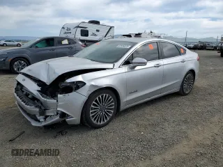 2018 Ford Fusion Hybrid Titanium with VIN 3FA6P0RUXJR137403, listed as a Copart auction lot 52606825 with 187,057 mi miles and Salvage Title. Bid and sale history available at carsss.com. Image 1.