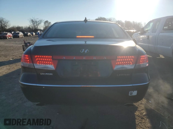 2009 Hyundai Azera Limited z VIN KMHFC46F79A341743, wystawiony jako Copart lot #83299354 z przebiegiem 98 779 mil mil oraz Szkoda całkowita • Salvage title. Historia ofert i sprzedaży dostępna na DreamBid. Obrazek 6.