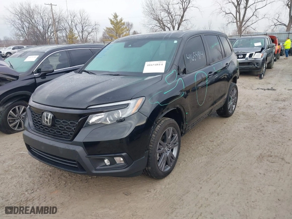 2021 Honda Passport EX-L with VIN 5FNYF8H57MB041815, listed as a IAAI auction lot 41654814 with 43,560 mi miles. Bid and sale history available at carsss.com. Image 21.