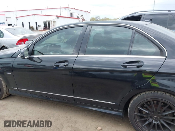 2012 Mercedes-Benz C-Class C 250 Sport with VIN WDDGF4HB6CA605476, listed as a IAAI auction lot 41974235 with 216,209 mi miles. Bid and sale history available at carsss.com. Image 15.