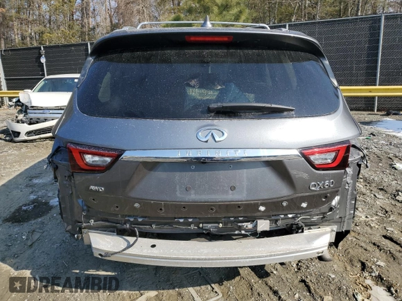 2020 Infiniti QX60 Pure with VIN 5N1DL0MM3LC517118, listed as a Copart auction lot 84210024 with 44,971 mi miles and Salvage title. Bid and sale history available at DreamBid. Image 6.
