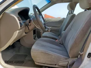 2002 Toyota Corolla CE with VIN 1NXBR12E32Z592708, listed as a Copart auction lot 62866195 with 226,871 mi miles and Clean title. Bid and sale history available at DreamBid. Image 7.