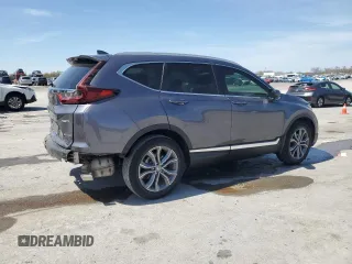 2021 Honda CR-V Touring z VIN 5J6RW2H94ML019220, wystawiony jako Copart lot #51437405 z przebiegiem 35 362 mil mil oraz Czysty tytuł • Clean title. Historia ofert i sprzedaży dostępna na DreamBid. Obrazek 3.