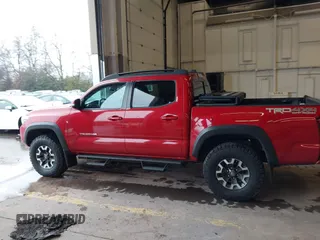 2019 Toyota Tacoma SR z VIN 3TMCZ5AN5KM220079, wystawiony jako IAAI lot #41856695 z przebiegiem 51 918 mil mil oraz . Historia ofert i sprzedaży dostępna na DreamBid. Obrazek 14.