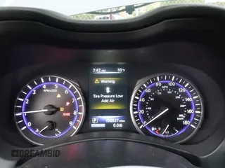 2015 Infiniti Q50 Premium with VIN JN1BV7AP1FM355875, listed as a IAAI auction lot 41777679 with 100,827 mi miles. Bid and sale history available at carsss.com. Image 7.