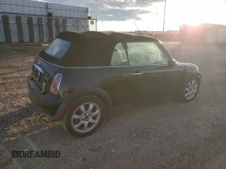2007 MINI Convertible with VIN WMWRF33597TG16707, listed as a Copart auction lot 79104014 with 113,380 mi miles and Salvage Title. Bid and sale history available at DreamBid. Image 3.
