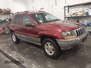 2000 Jeep Grand Cherokee Laredo z VIN 1J4GW48N8YC151600, wystawiony jako IAAI lot #42178535 z przebiegiem 71 207 mil mil oraz . Historia ofert i sprzedaży dostępna na DreamBid. Obrazek 1.
