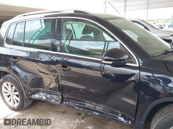 2017 Volkswagen Tiguan Wolfsburg Edition with VIN WVGRV7AX5HW501063, listed as a IAAI auction lot 42099362 with 76,597 mi miles and . Bid and sale history available at DreamBid. Image 13.