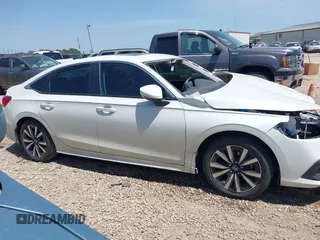 2023 Honda Civic EX with VIN 2HGFE1F76PH324177, listed as a IAAI auction lot 42253724 with 26,950 mi miles and . Bid and sale history available at DreamBid. Image 14.