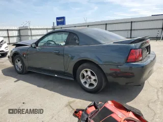 1999 Ford Mustang z VIN 1FAFP4041XF140264, wystawiony jako Copart lot #54801555 z przebiegiem 156 514 mil mil oraz Szkoda całkowita • Salvage title. Historia ofert i sprzedaży dostępna na DreamBid. Obrazek 2.