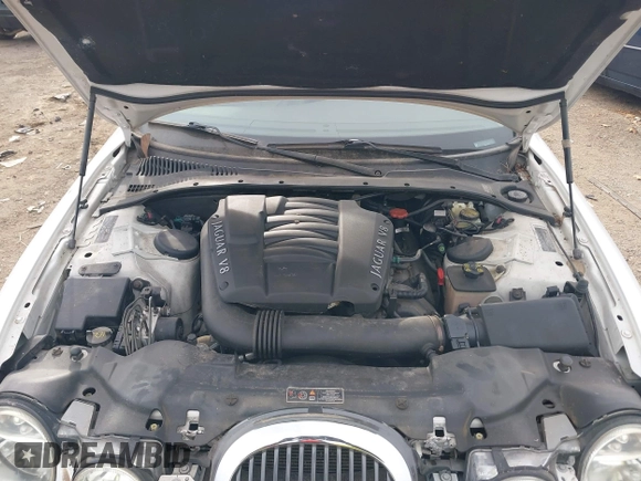 2002 Jaguar S-Type with VIN SAJDA01P12GM35163, listed as a IAAI auction lot 41097415 with 114,017 mi miles and . Bid and sale history available at DreamBid. Image 10.