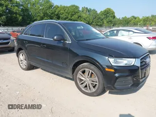 2016 Audi Q3 Premium Plus z VIN WA1BFCFS9GR003187, wystawiony jako IAAI lot #42609080 z przebiegiem 146 379 mil mil oraz . Historia ofert i sprzedaży dostępna na DreamBid. Obrazek 1.