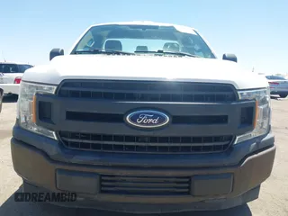 2018 Ford F-150 XL with VIN 1FTMF1CB1JKC58164, listed as a IAAI auction lot 42289514 with 57,075 mi miles and . Bid and sale history available at DreamBid. Image 13.