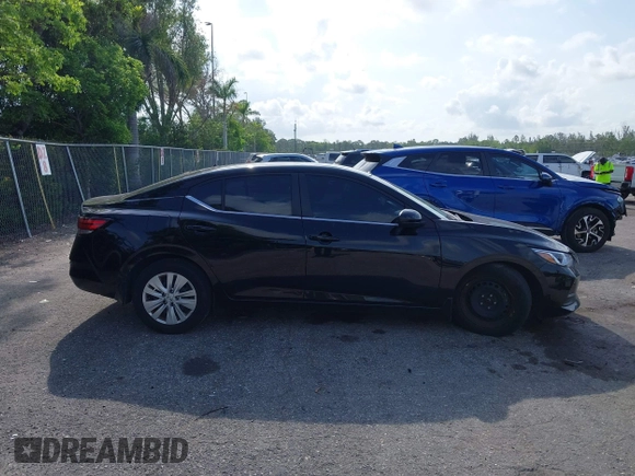 2023 Nissan Sentra S z VIN 3N1AB8BV7PY287992, wystawiony jako IAAI lot #42335056 z przebiegiem 14 482 mil mil oraz . Historia ofert i sprzedaży dostępna na DreamBid. Obrazek 13.