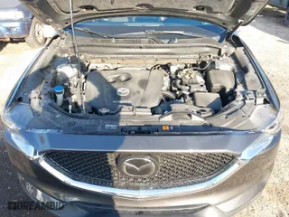 2020 Mazda CX-5 Touring with VIN JM3KFACM2L0786598, listed as a IAAI auction lot 41933368 with 93,657 mi miles. Bid and sale history available at carsss.com. Image 10.